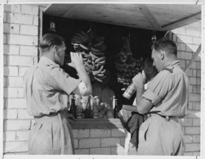 Two soldiers taking refreshment at the Nathaniya Leave Camp, Palestine, World War II