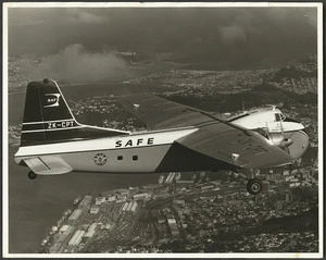 Safe Air Ltd Bristol 170 Freighter aircraft ZK-CPT, Merchant Courier, flying over Wellington city - Photographer unidentified