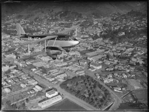 Cook Strait Airways De Havilland DH 89A Dragon Rapide aircraft ZK-AEW, Mars, over Nelson