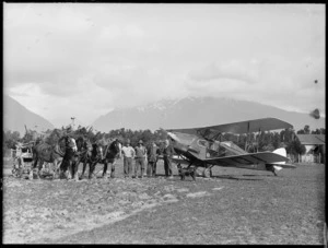 Group with Air Travel Ltd Fox Moth aircraft, Nolan's, Okuru, West Coast