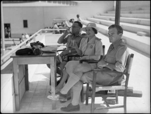 Lady Freyberg with Colonel McGavin and a Regimental Officer at 19 NZ Armoured Regiment swimming sports, Cairo - Photograph taken by G Kaye