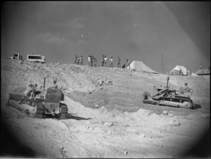 Bulldozers working on site of El Djem Theatre in Maadi Camp, Egypt - Photograph taken by George Kaye