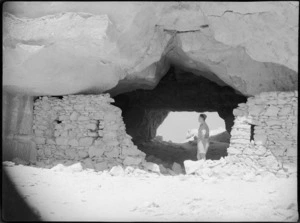 Soldier standing in a cave at Tura, Egypt - Photograph taken by G Kaye