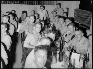 Soldiers from Rotorua and District seated at reunion dinner in Cairo, World War II - Photograph taken by G Kaye