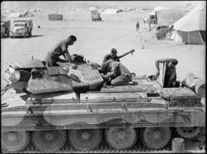 Men at 4th Armoured Brigade workshops in Maadi, Egypt, working on a Crusader tank - Photograph taken by George Kaye