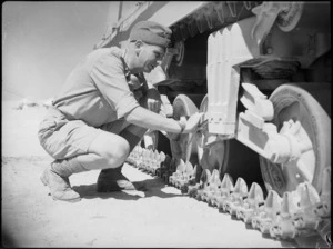 Inspection of tank suspension at 4th Armoured Brigade workshops in Maadi, Egypt - Photograph taken by George Kaye