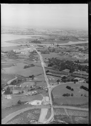 Development of the North Western Motorway, Te Atatu, Auckland, with Auckland City in the background