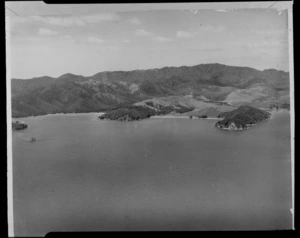 Opunga Cove with beach and bush covered headlands next to Assassination Cove to the left, Orokawa Bay, Bay of Island, Northland