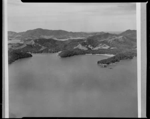 Opunga Cove with beach and bush covered headlands next to Assassination Cove to the left, Orokawa Bay, Bay of Islands, Northland