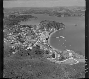 Russell, Bay of Islands includes housing, roads, shoreline and bush