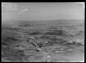Moerewa Township, Northland, looking north east along George Street (State Highway 1) and Otiria Road, with residential housing foreground to the AFFCO dairy factory, with farmland and Kawakawa Township beyond