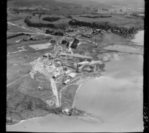 Portland Cement Works, located on the Whangarei Harbour coast, Northland, with Portland residential settlement and farmland beyond