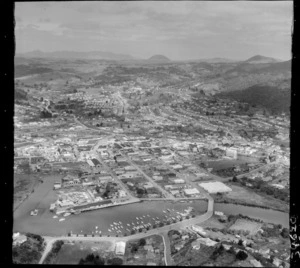 Whangarei, Northland, with marina on Hatea River and Riverside Drive Bridge, looking south west to town with railway yards and buildings