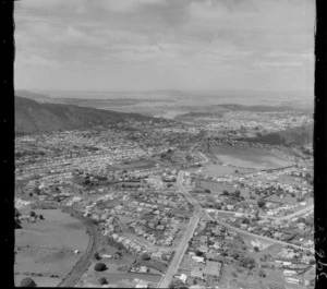 Whangarei, Northland, looking south over Kamo Road and Whau Valley Road intersection to Kensington Racecourse, with Whangarei township and harbour beyond