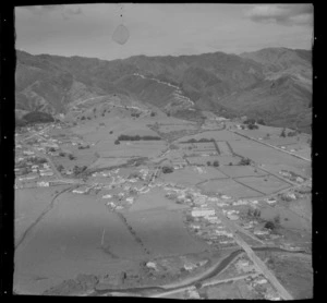 Coromandel township with Whangarahi Stream and Wharf Road in foreground and the Whangapoua Road State Highway 25 on hills beyond, Thames-Coromandel District