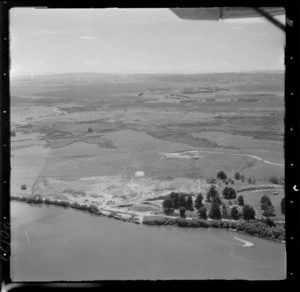 Mercer coal fired Power Station under construction on the banks of the Waikato River, farmland beyond, Waikato Region