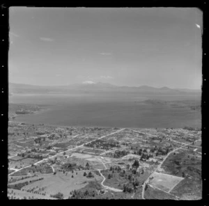 Taupo, includes view of lake, roads, housing, and Mt Ruapehu