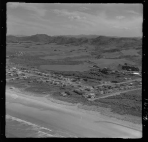 Waihi Beach, Bay of Plenty, includes beach, roads, housing and farmland