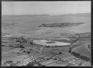 Mangere drainage area next to Ambury Farm Park with Miller and Wallace Roads, with Puketutu Island beyond, Manukau Harbour, Auckland City