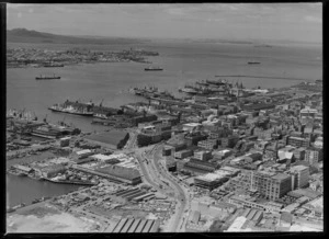 Fanshawe Street and Market Place with city markets, with Ports of Auckland Wharves beyond, Auckland City