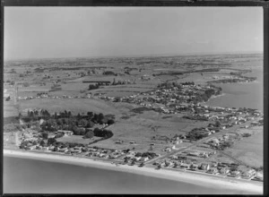 Eastern Beach with The Esplanade, East and Bucklands Beach Roads with housing and farmland, looking to Half Moon Bay, Auckland City