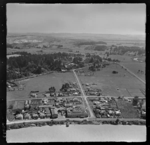 Dargaville, Northland, includes wharf, shoreline, industrial buildings, township, housing and farmland