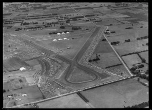 Grand Prix race, cars on start grid with spectators looking on, Ardmore Airport, Auckland City