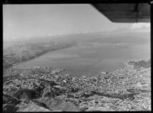 Wellington City and Harbour with wharf area in foreground to Somes Island and the Hutt Valley beyond
