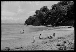 Tindalls Beach, Whangaparaoa Peninsula, with unidentified women and children on the beach