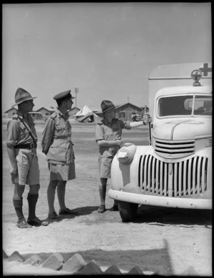 Brigadier Kenrick and Lieutenant Colonel Waite inspect ambulance donated to 23rd NZ Field Ambulance at Maadi - Photograph taken by G Bull