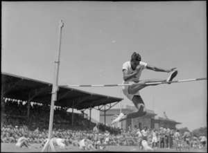 G Baker attempting a high jump at NZ Division Athletics Championships, Cairo, Egypt, World War II - Photograph taken by George Kaye