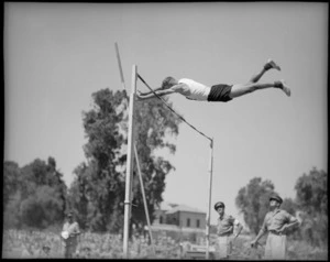 Opie wins the pole vault at NZ Division Athletics Championships, Cairo, Egypt, World War II - Photograph taken by George Kaye