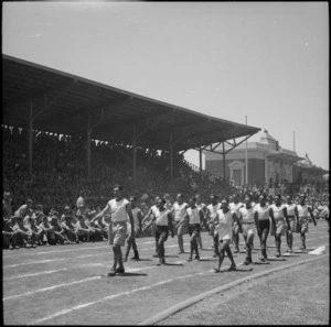 Maori team parades at NZ Division Athletics Championships, Cairo, Egypt, World War II - Photograph taken by George Bull