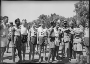 Drawing players in the invitation relay race at NZ Division Athletics Championships, Cairo, Egypt, World War II - Photograph taken by George Kaye