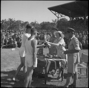 Lady Freyberg presenting the Freyberg Cup to tied winning regiments at NZ Division Athletics Championships, Cairo, Egypt, World War II - Photograph taken by George Kaye