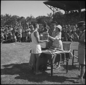 Lady Freyberg presents the Stillwell Trophy to the NZ Artillery at NZ Division Athletics Championships, Cairo, Egypt, World War II - Photograph taken by George Kaye