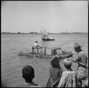 NZ Engineers' experimental amphibious bren carrier enters the water of the Nile at Maadi, Egypt - Photograph taken by George Bull