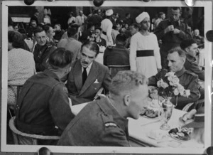 British Minister Richard Casey in conversation with returned Kiwis at a garden party for repatriated POWs, Gazira Sporting Club, Cairo