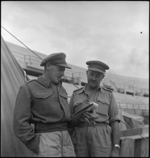 Major Ian Stock confers with Brigadier S H Crump in Italy, World War II - Photograph taken by George Kaye