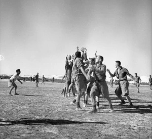 New Zealand soldiers playing a game of rugby in the Western Desert, Egypt