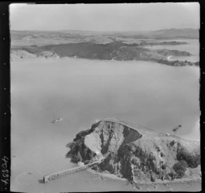 Karamuramu Island, Auckland, includes boats and jetty