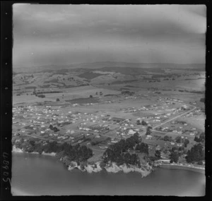 Beachlands, Auckland, includes housing, roads, township shoreline and farmland