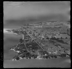 Beachlands, Auckland, includes housing, roads, township shoreline and farmland