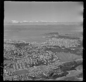 Wellington western suburb of Karori with Ben Burn Park in foreground looking to Wellington City and Harbour beyond