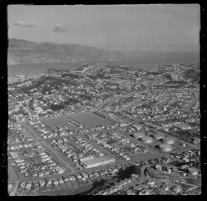 Wellington City eastern suburb of Miramar on the Miramar Peninsula with oil storage tanks, with Wellington Harbour entrance beyond