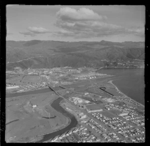 The suburb of Petone in foreground with the Hutt River and side channel confluence, Hutt Park Raceway and Seaview with fuel tanks and Wellington Harbour beyond, Hutt Valley, Wellington Region