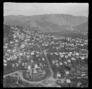 Wadestown Hill and Lennel Road with footbridge in foreground, with Ngaio and Mount Kaukau beyond, Wellington City