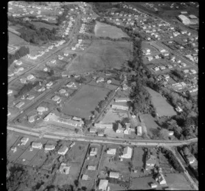 Henderson Primary School next to a large sports field with an unidentified road, West Auckland