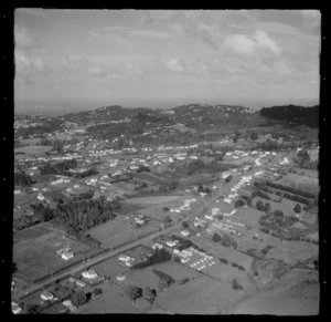 Aerial view of Prospect Road in Glen Eden, West Auckland, with Titirangi in the distance