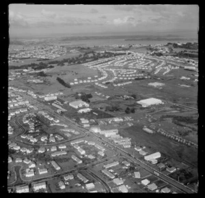 Stoddard Road with Auckland Council bus depot and lumber yard, with Winstone Park and Manukau Harbour beyond, Onehunga, Auckland